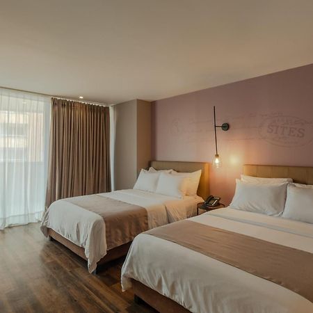 Sites Hotel เมเดยิน ภายนอก รูปภาพ A room at the hotel