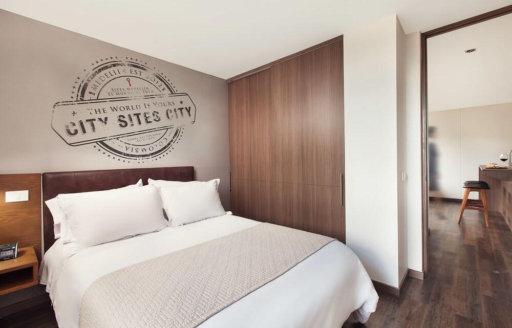 Sites Hotel เมเดยิน ภายนอก รูปภาพ A bedroom in a typical apartment