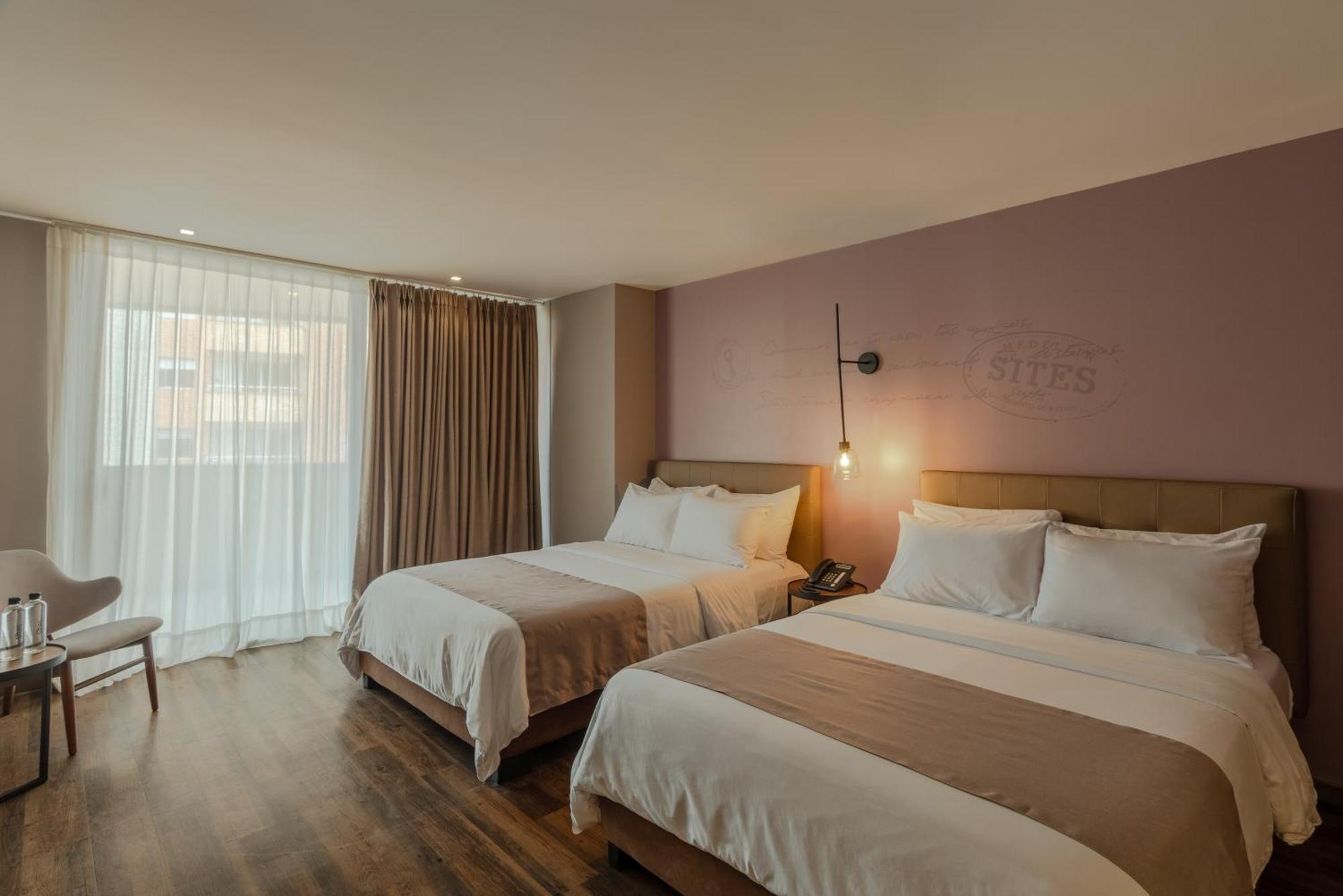 Sites Hotel เมเดยิน ภายนอก รูปภาพ A room at the hotel