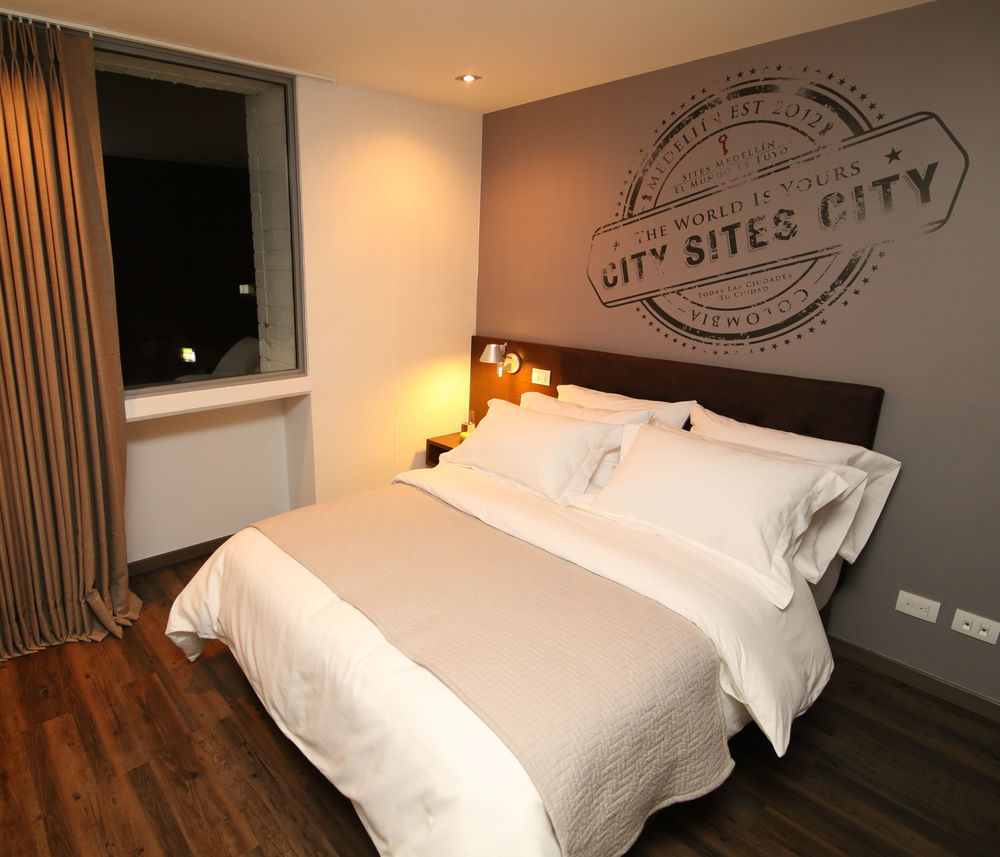 Sites Hotel เมเดยิน ภายนอก รูปภาพ A bedroom at the hotel
