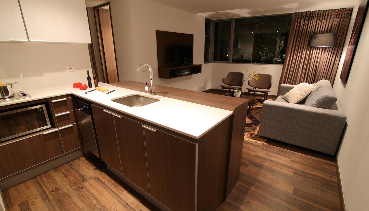Sites Hotel เมเดยิน ภายนอก รูปภาพ A modern open-plan kitchen